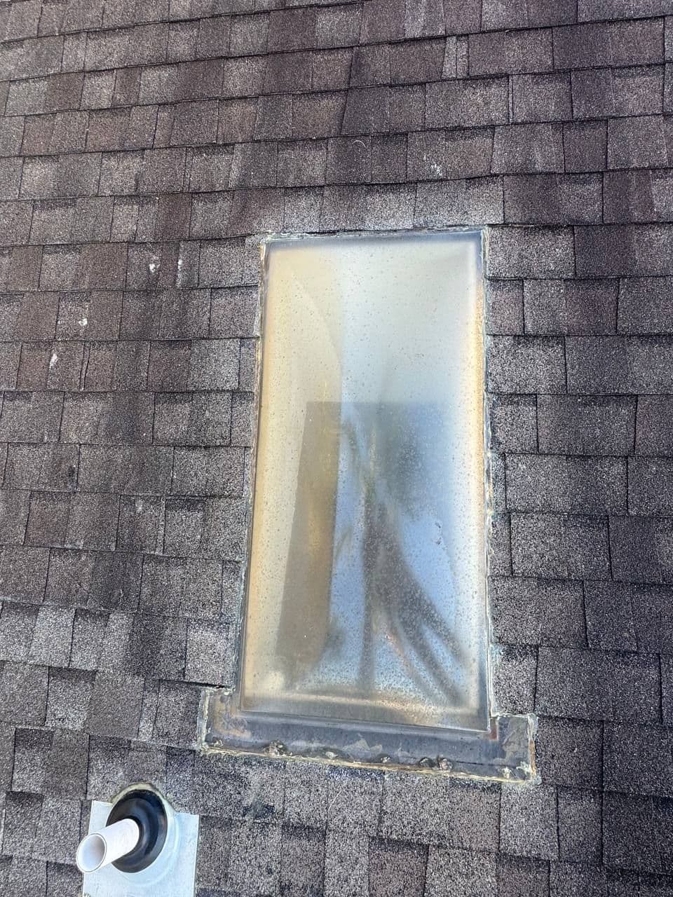 Residential roof. Skylight and Shingle roof replacement with peel&stick underlayment. Panama City Beach, FL